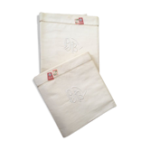 Pair mixed pillowcases embroidered A B.
