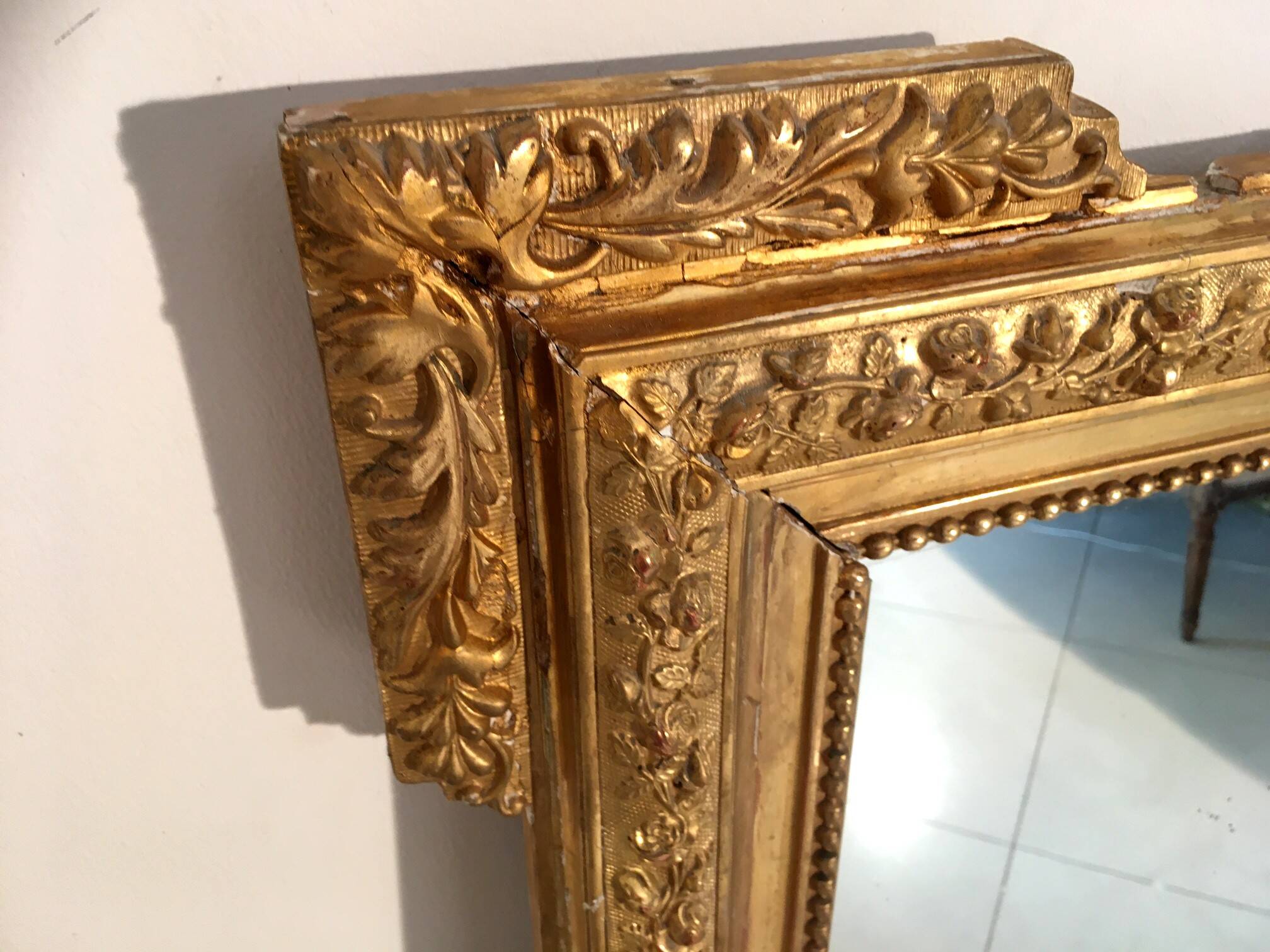 Louis XVI style and 19th century fireplace mirror