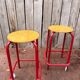 Vintage red industrial stool with a wooden seat, 1960s.