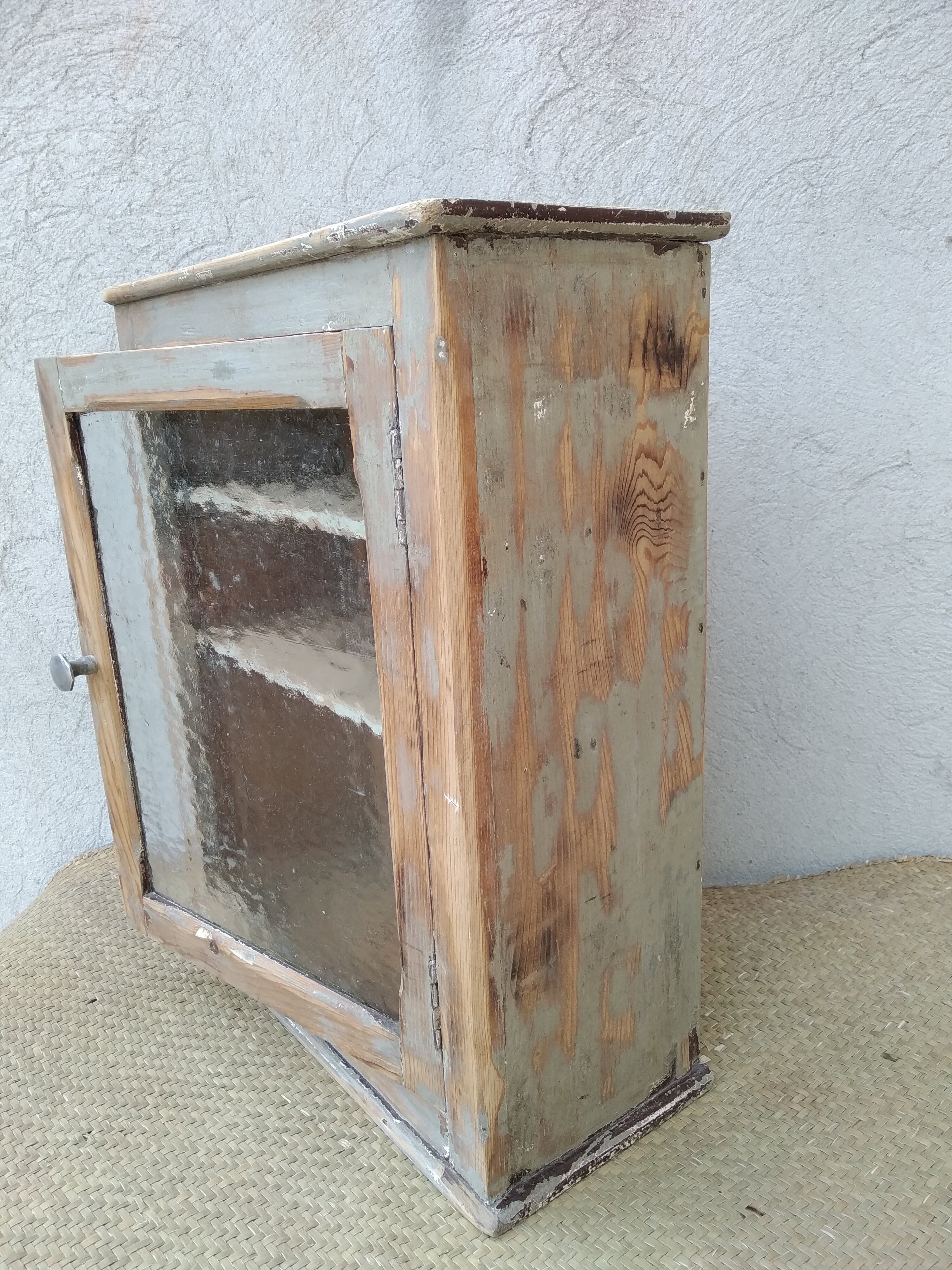 Antique wooden bathroom cabinet patinated