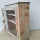 Antique wooden bathroom cabinet patinated