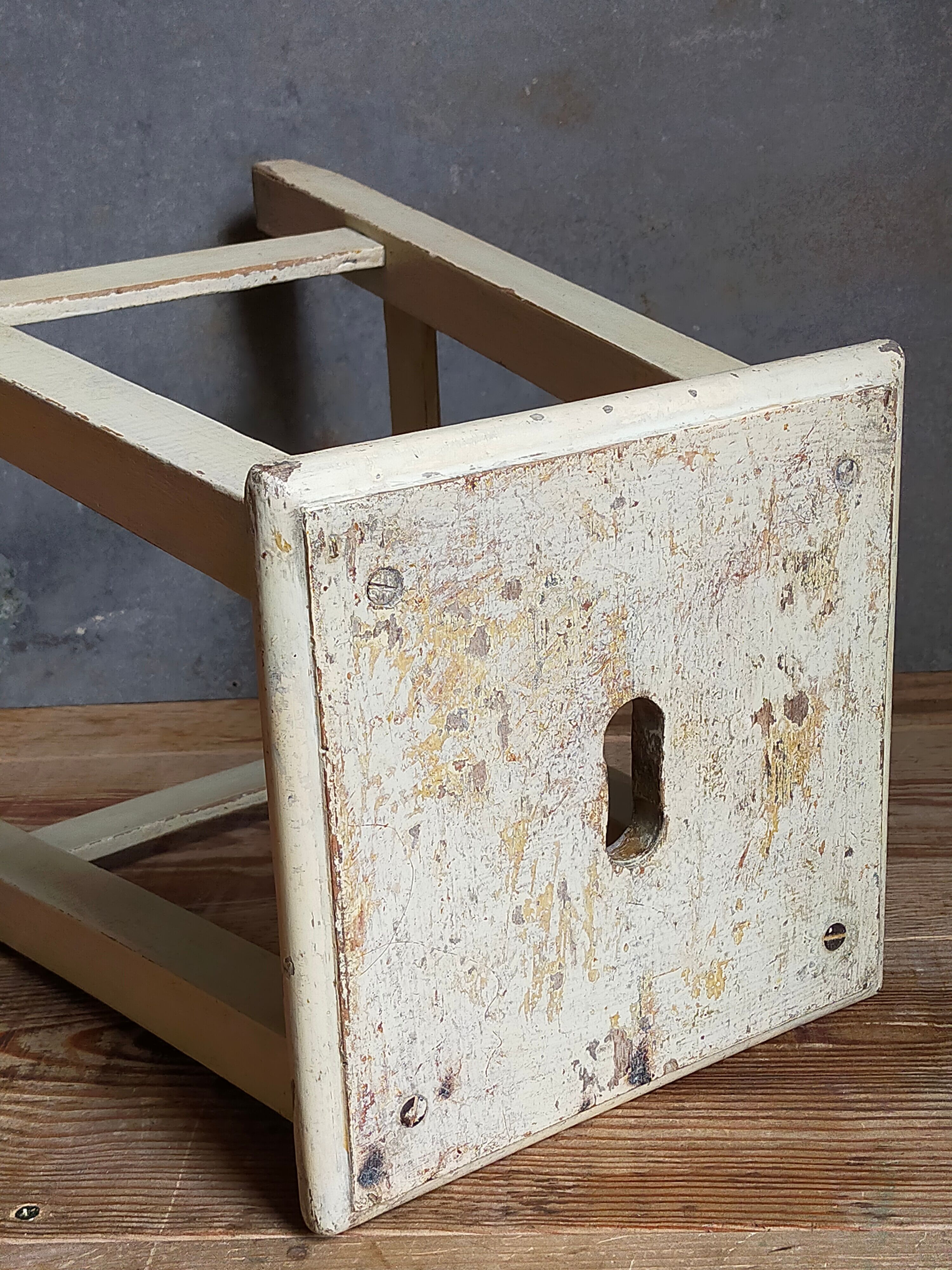Wooden workshop stool with old patina