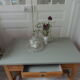 Table basse vintage, piétement, ceinture, tiroir et tablette bois, plateau vert de gris.