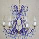 lustre bleu, fait de perles.