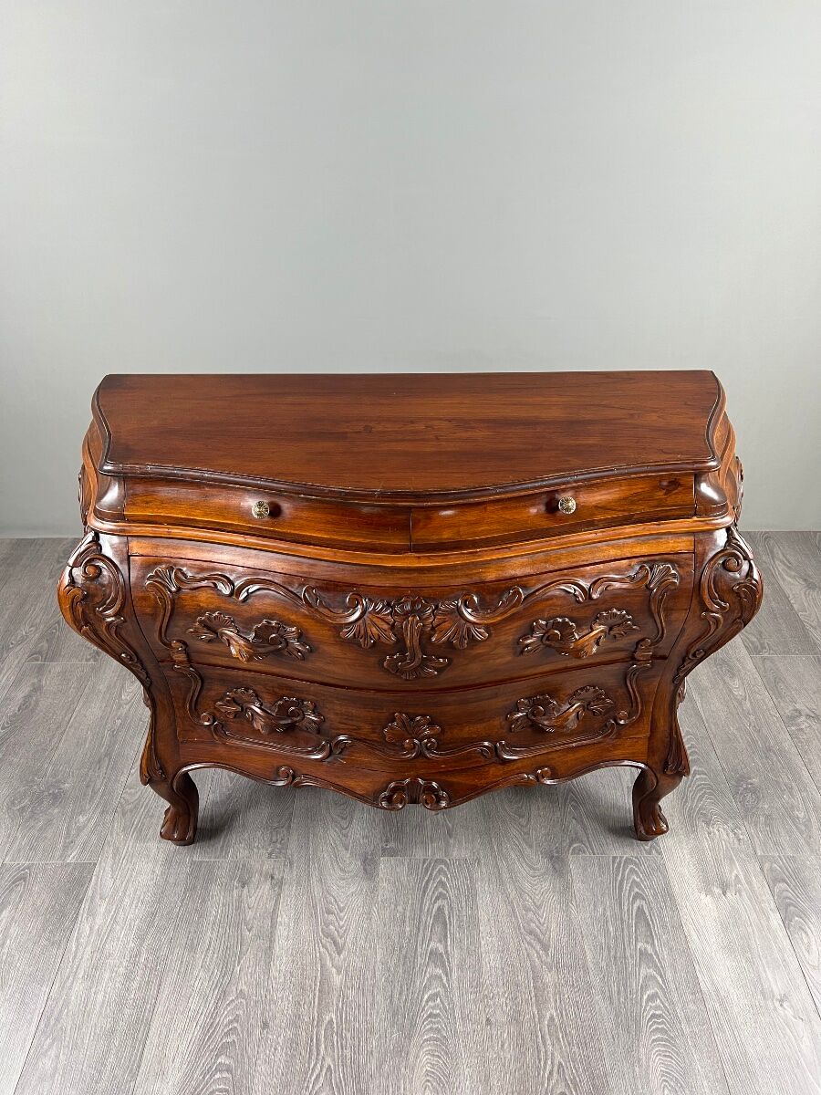 Curved commode in the Louis XV style, carved wood, 19th century.