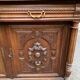 Henri II sideboard in carved wood, 1930.