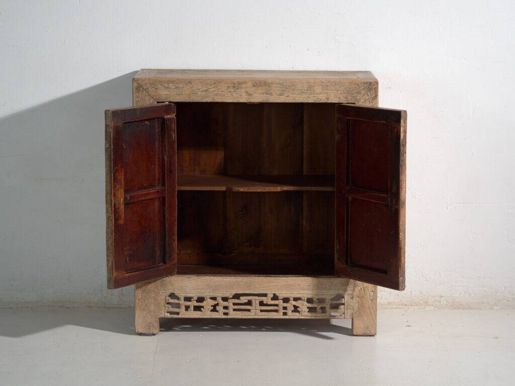 Antique low cabinet in elm with openwork apron – China, circa 1950