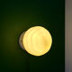 Applique globe vintage art déco en opaline jaune pâle