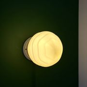Vintage Art Deco globe wall light in pale yellow opaline.