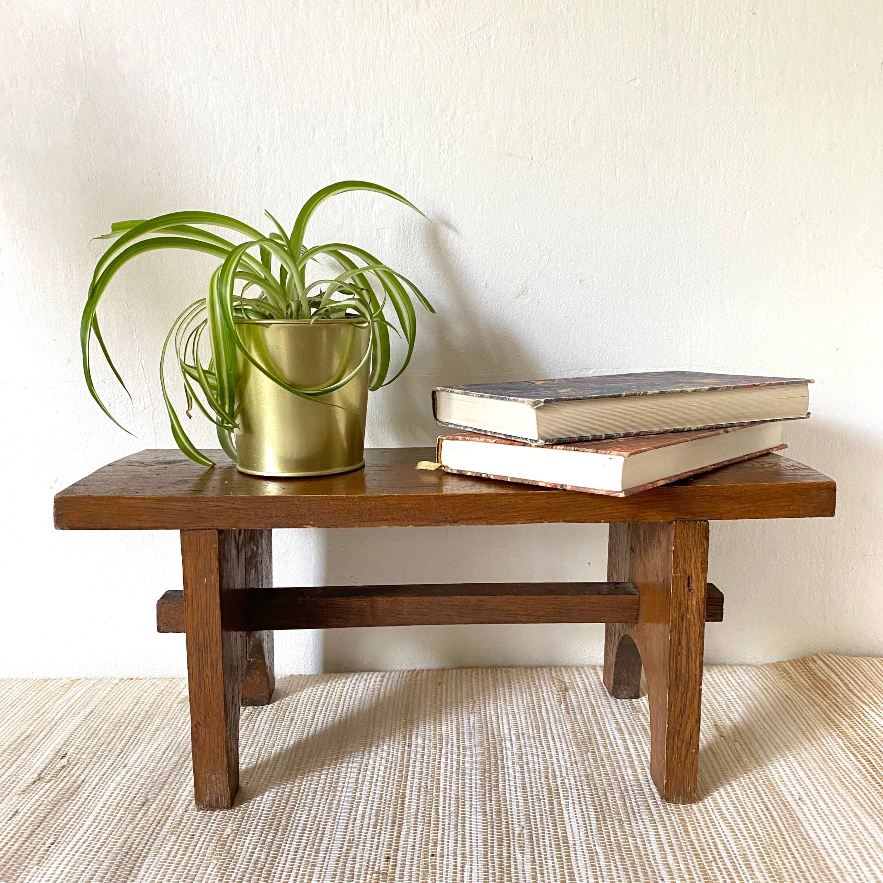 Low stool or wooden plant holder