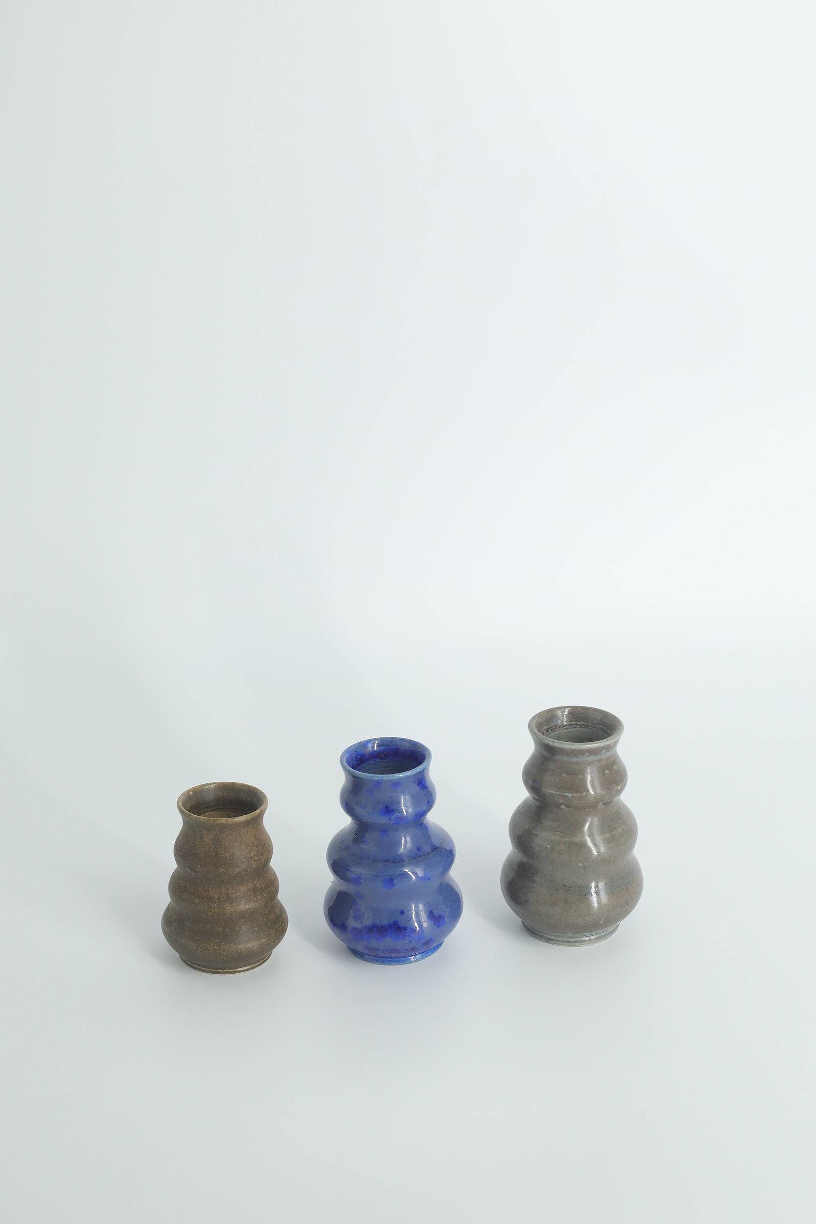Small collection vases, mid-century modern Scandinavian, in glossy brown and blue stoneware, set of 3.