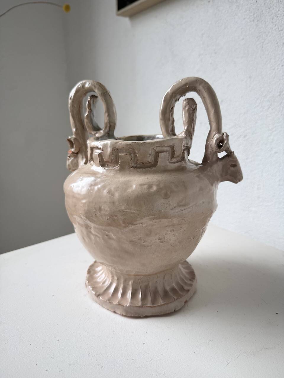 Ceramic bowl with ram heads