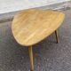Scandinavian coffee table in the shape of a pebble/bean made of light solid wood from the years.