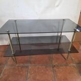 Smoked glass and brass coffee table from the 1970s.