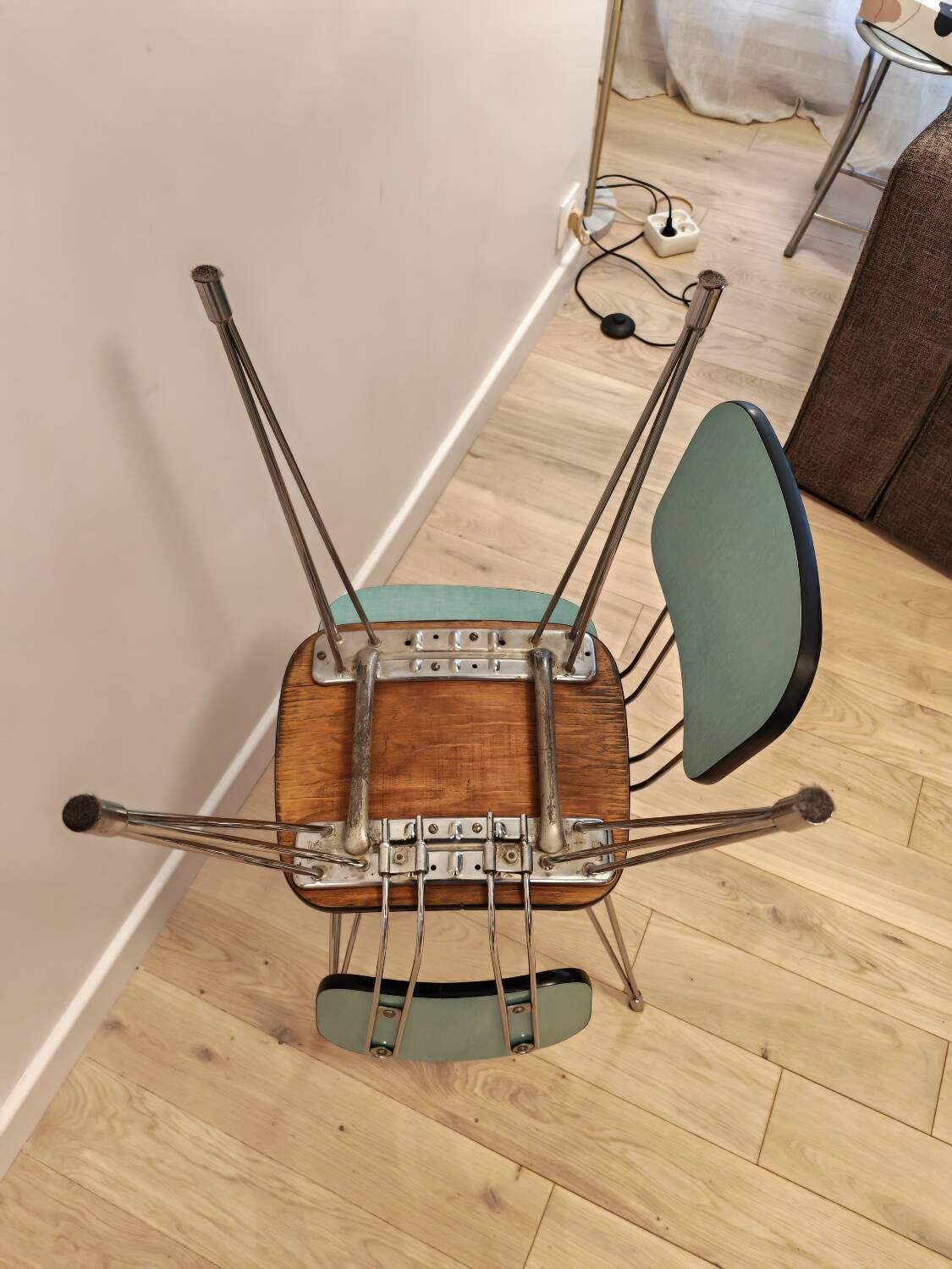 Pair of green Formica chairs with Eiffel legs