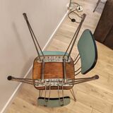 Pair of green Formica chairs with Eiffel legs