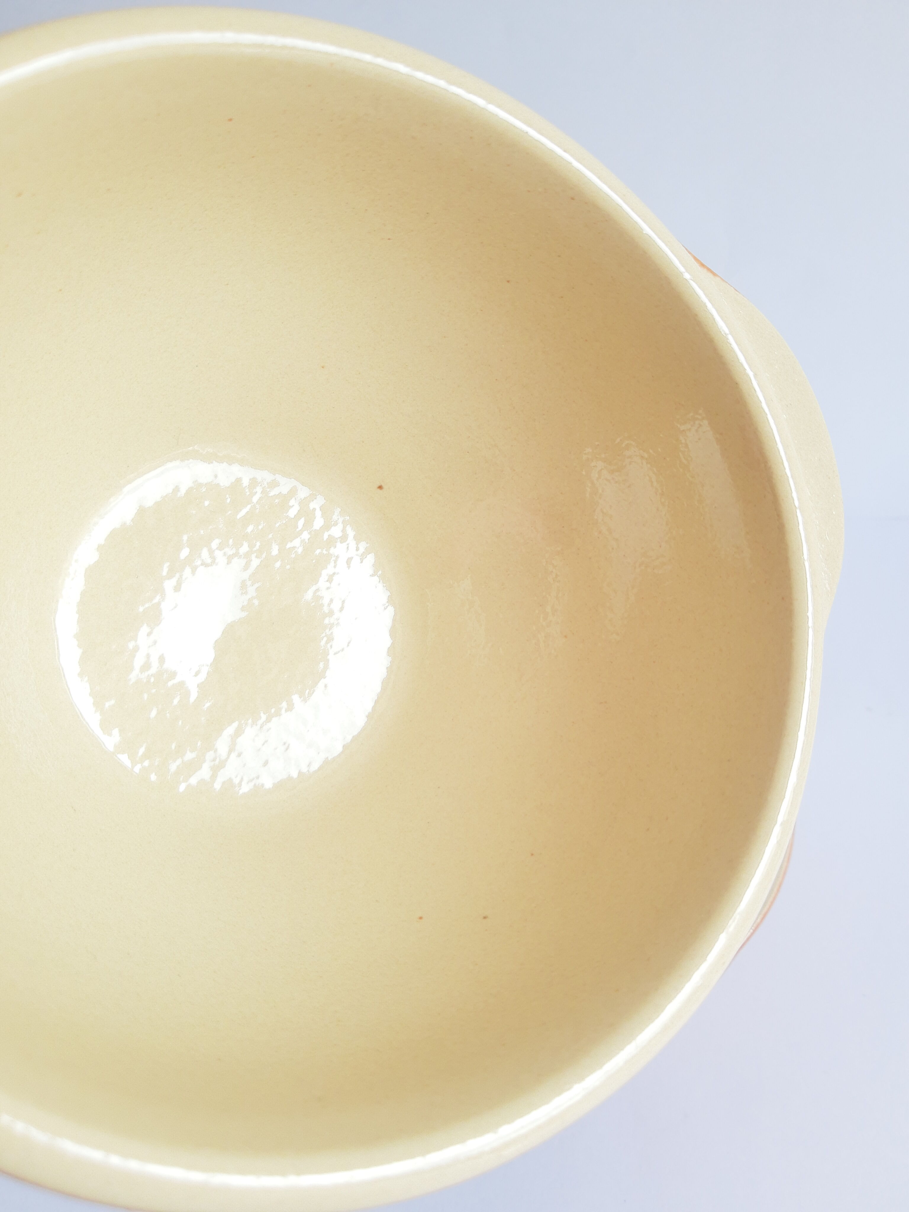 Duo of vintage Emile Henry cognac ear bowls