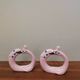 Set of 2 vintage ceramic barbotine napkin rings in the shape of a crane bird