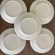 Vintage Longchamp France service – 18 graphic plates from the 1950s.