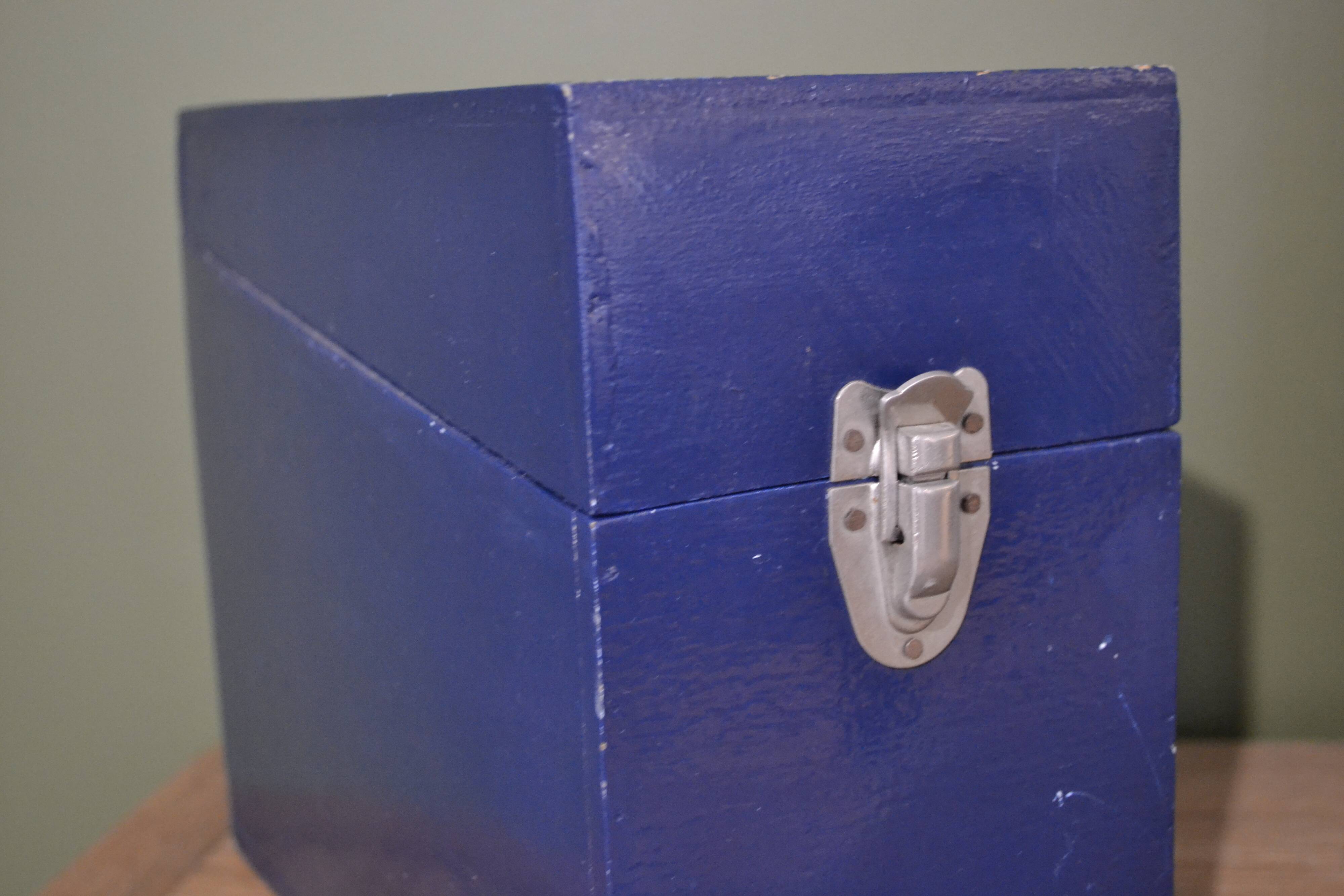 Blue painted wooden plug box