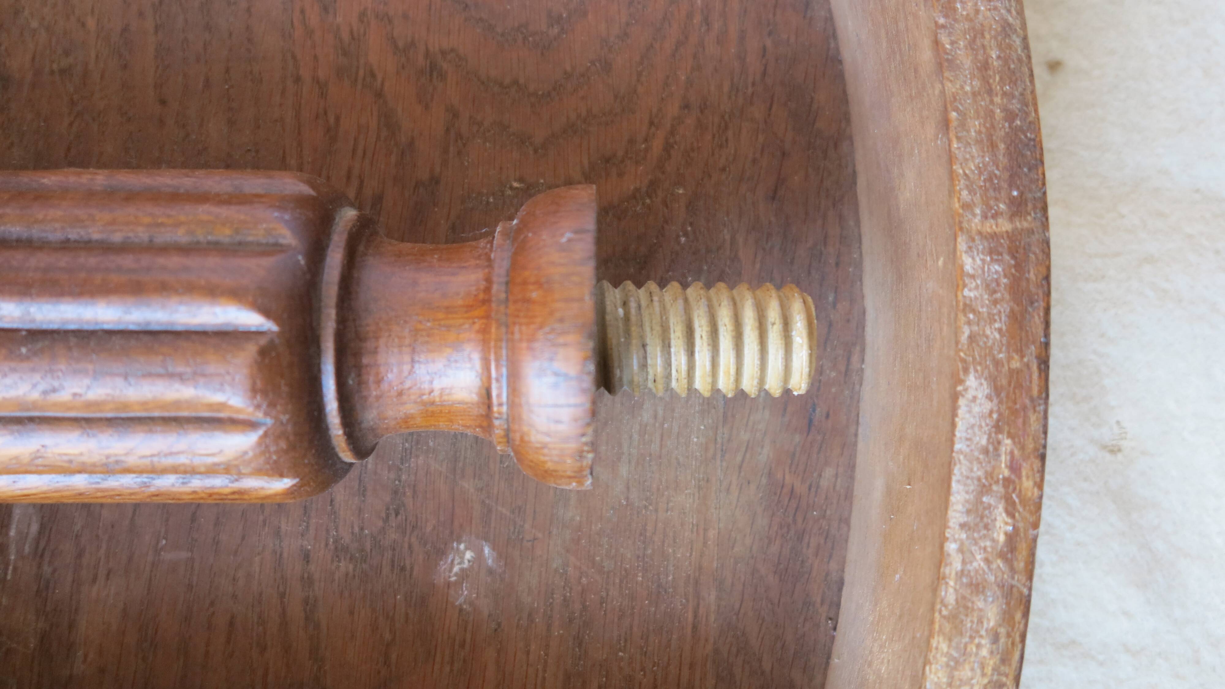 1930s oak dining table, slightly oval.