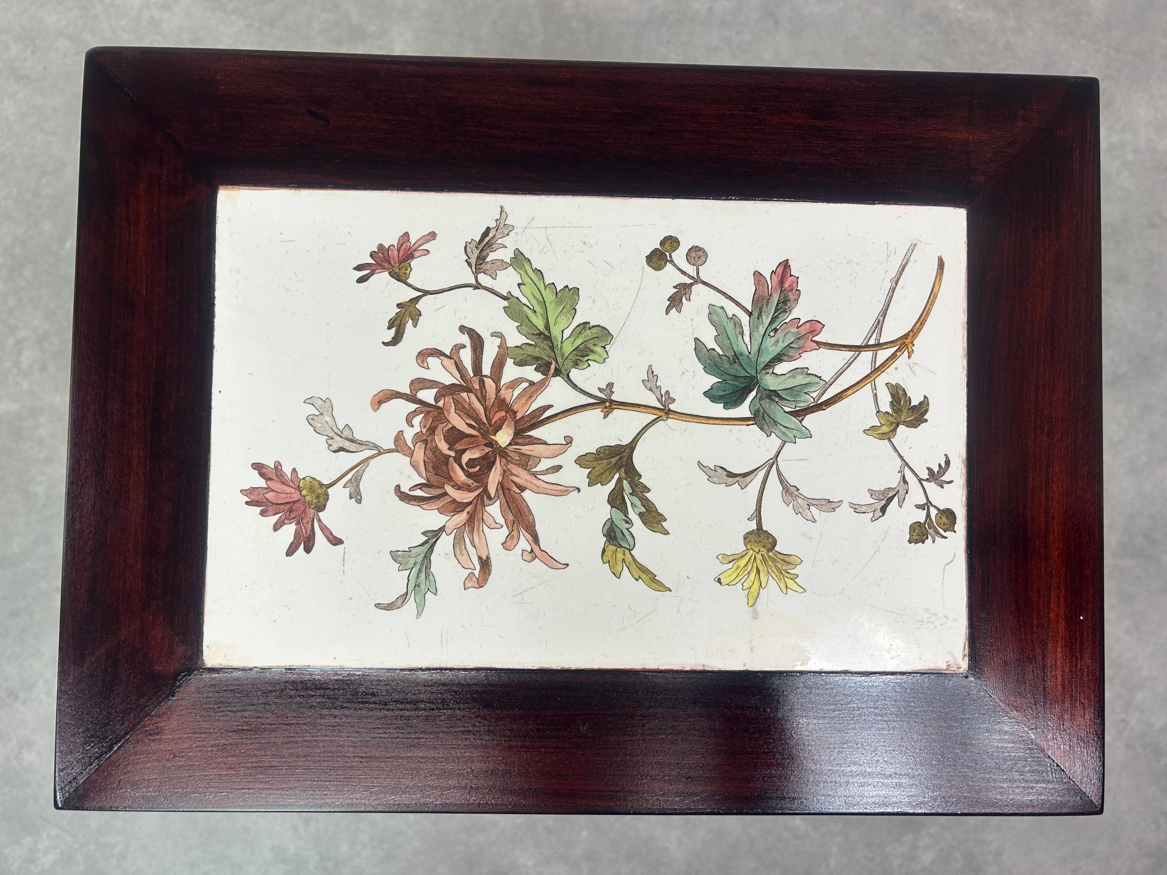 Nested tables in curved wood with ceramic top by Thonet.