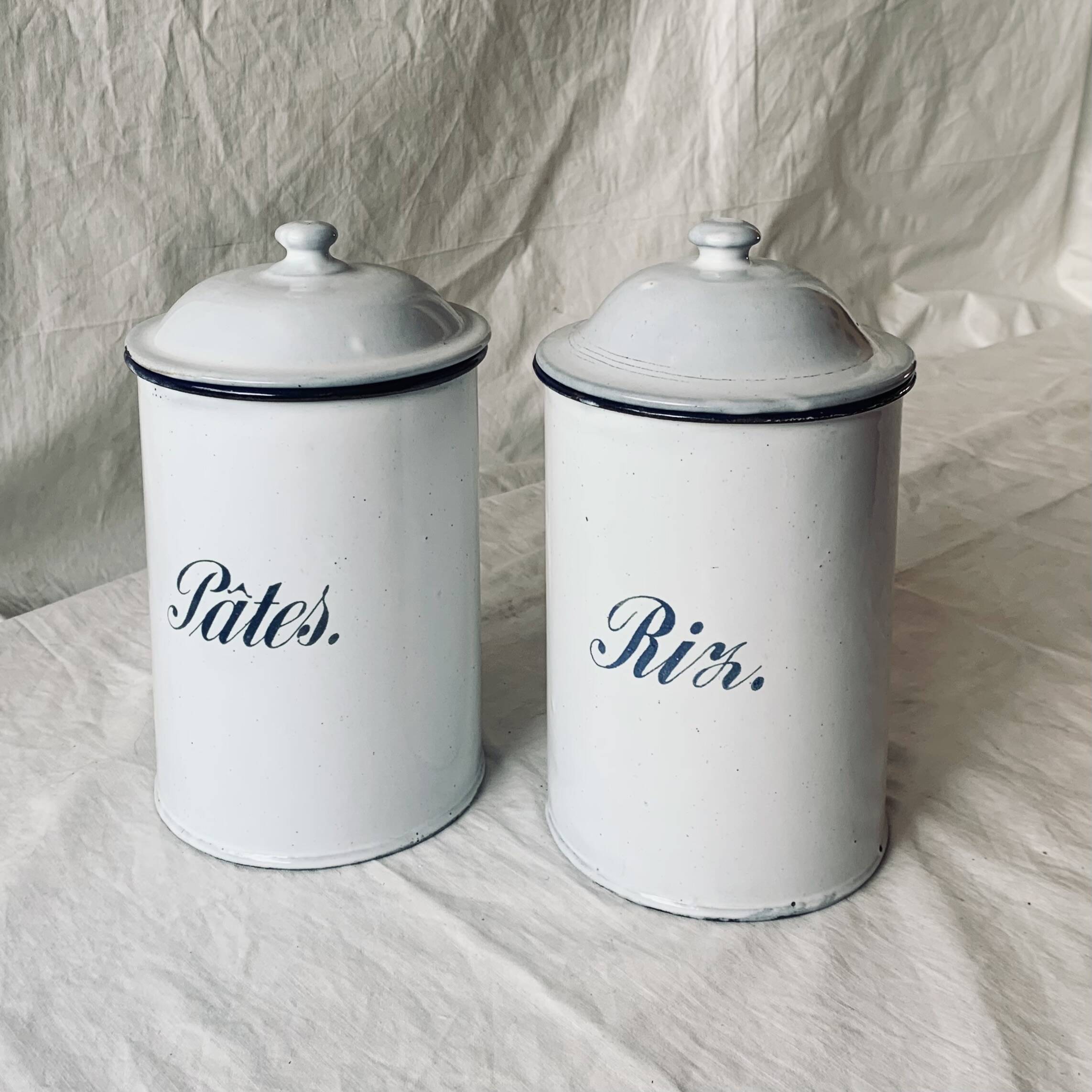 Pair of old large enameled sheet metal condiment pots