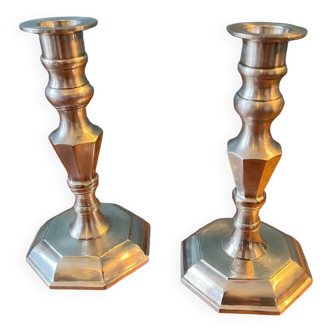 Pair of silver metal candlesticks