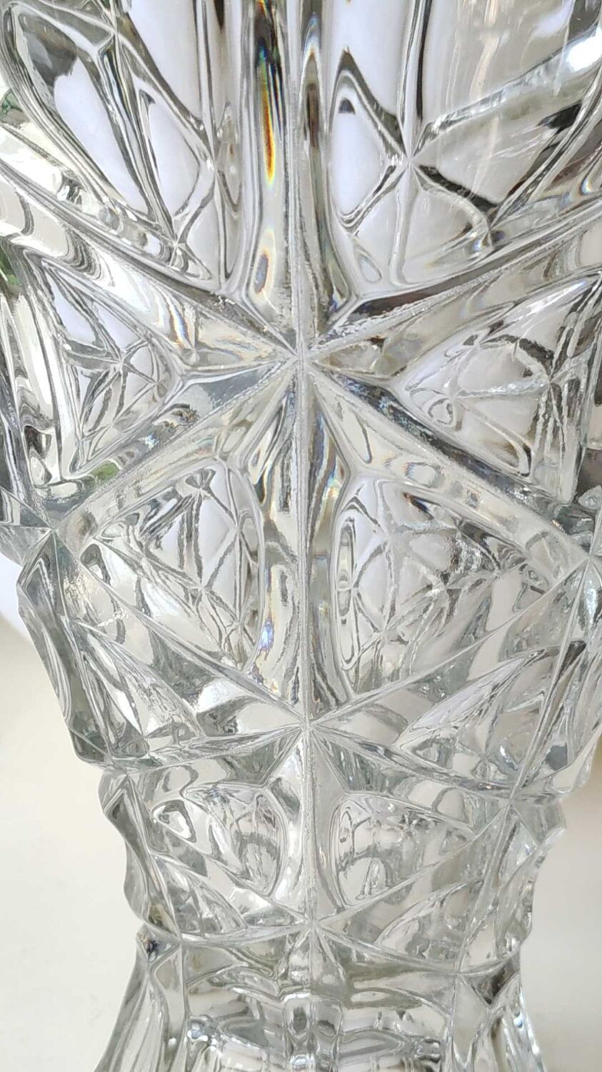 Vintage design vase in crystal. faceted patterns, braces. flared neck