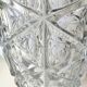 Vintage design vase in crystal. faceted patterns, braces. flared neck