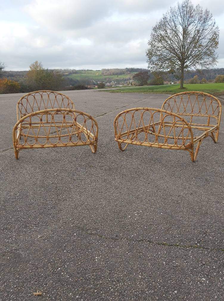 Old rattan bed pair