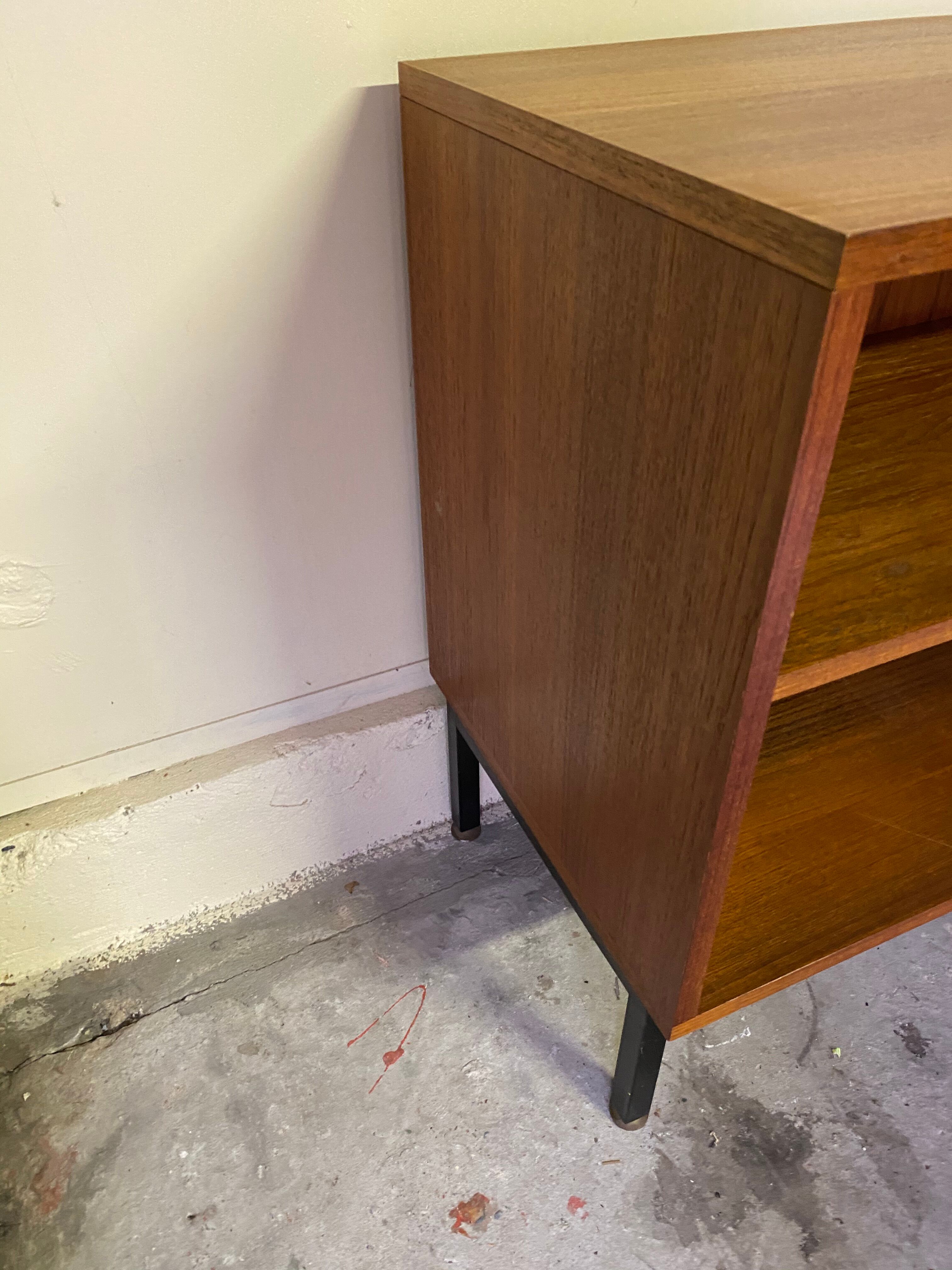 Sober vintage box furniture on adjustable metal feet