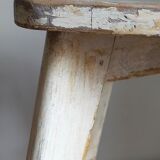 Old workshop stool in patinated solid wood
