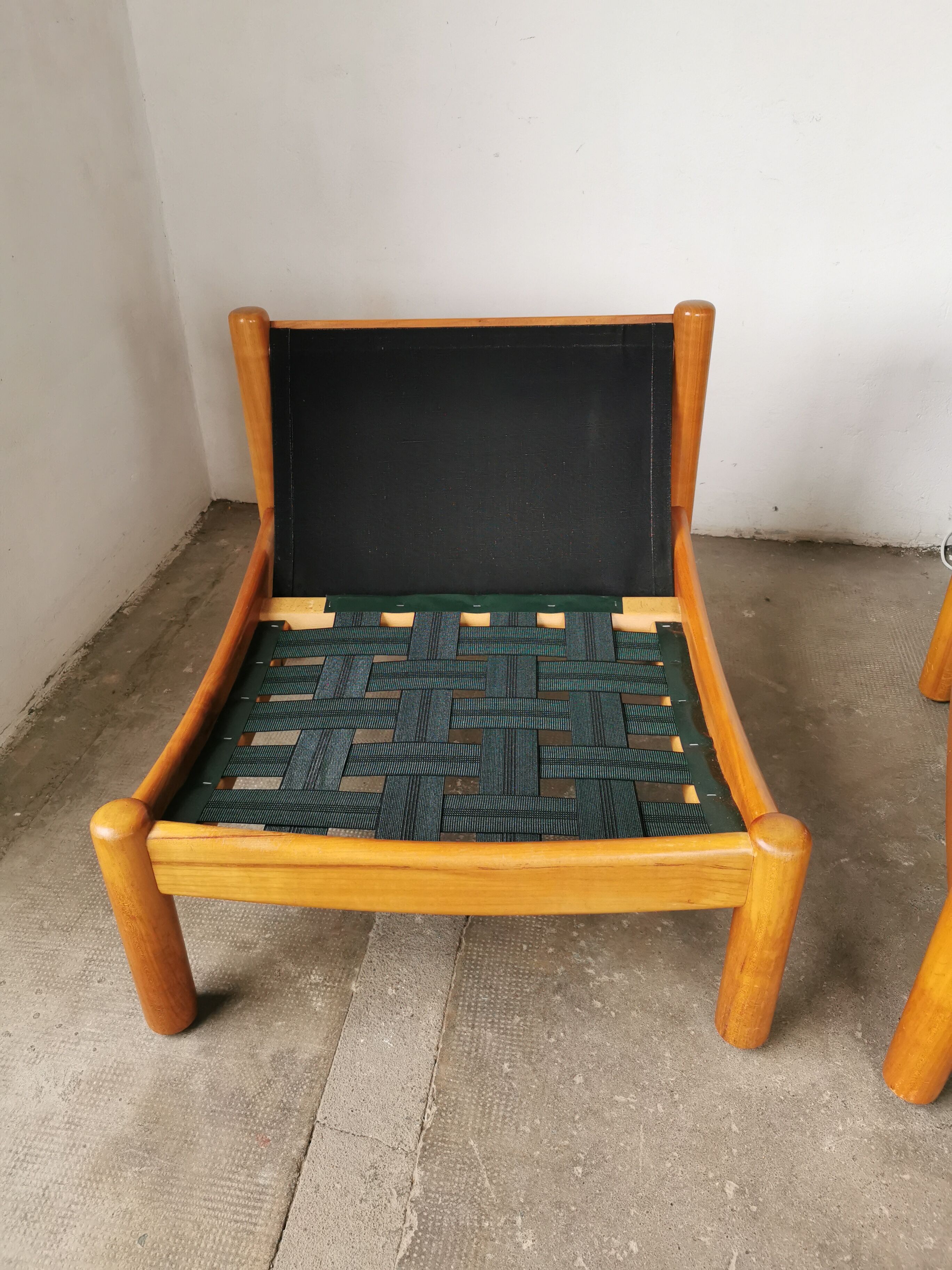 Pair of designer leather armchairs 80s
