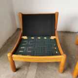 Pair of designer leather armchairs 80s