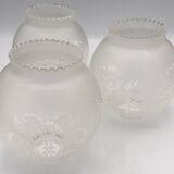 Set of 3 globes with matte glass lampshades and engraved decoration