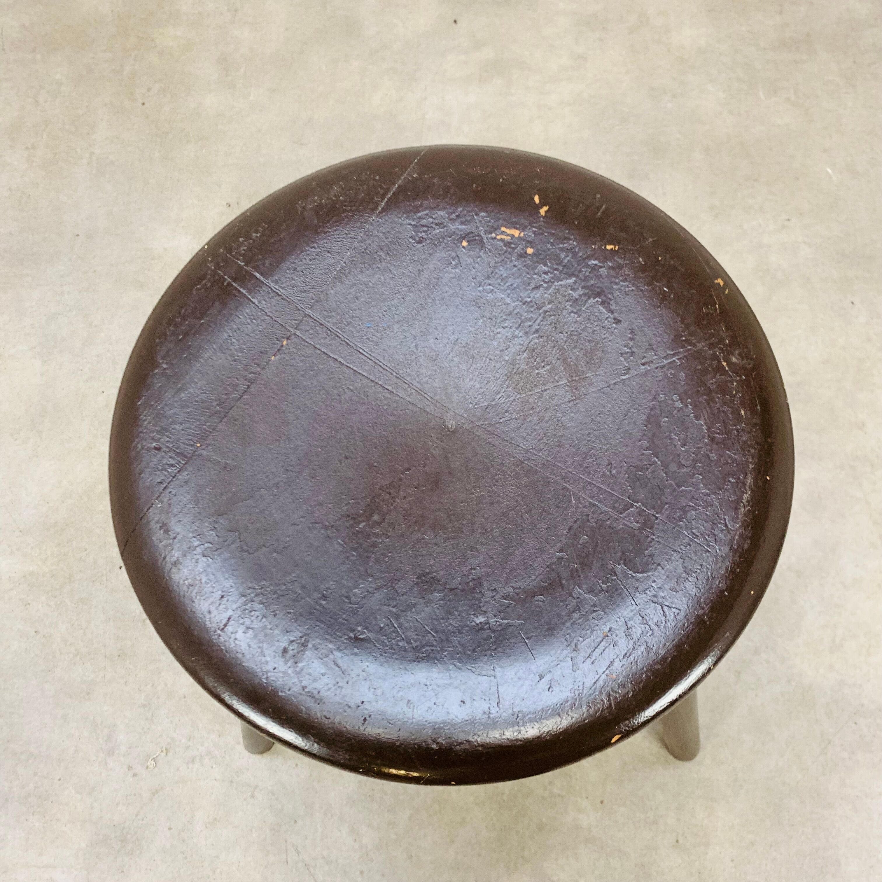 Industrial metal and wood tripod stool