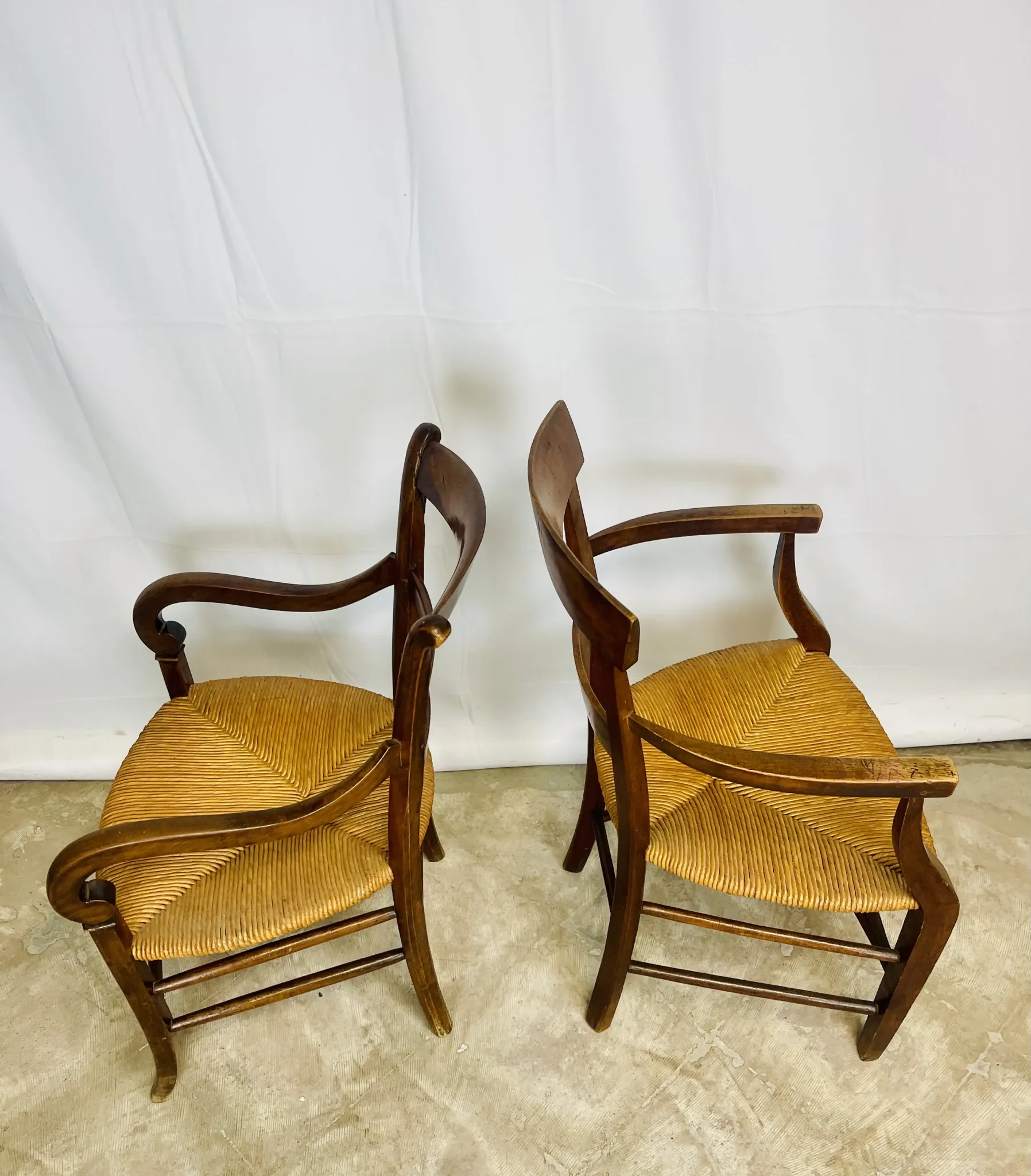 Pair of dissimilar walnut armchairs