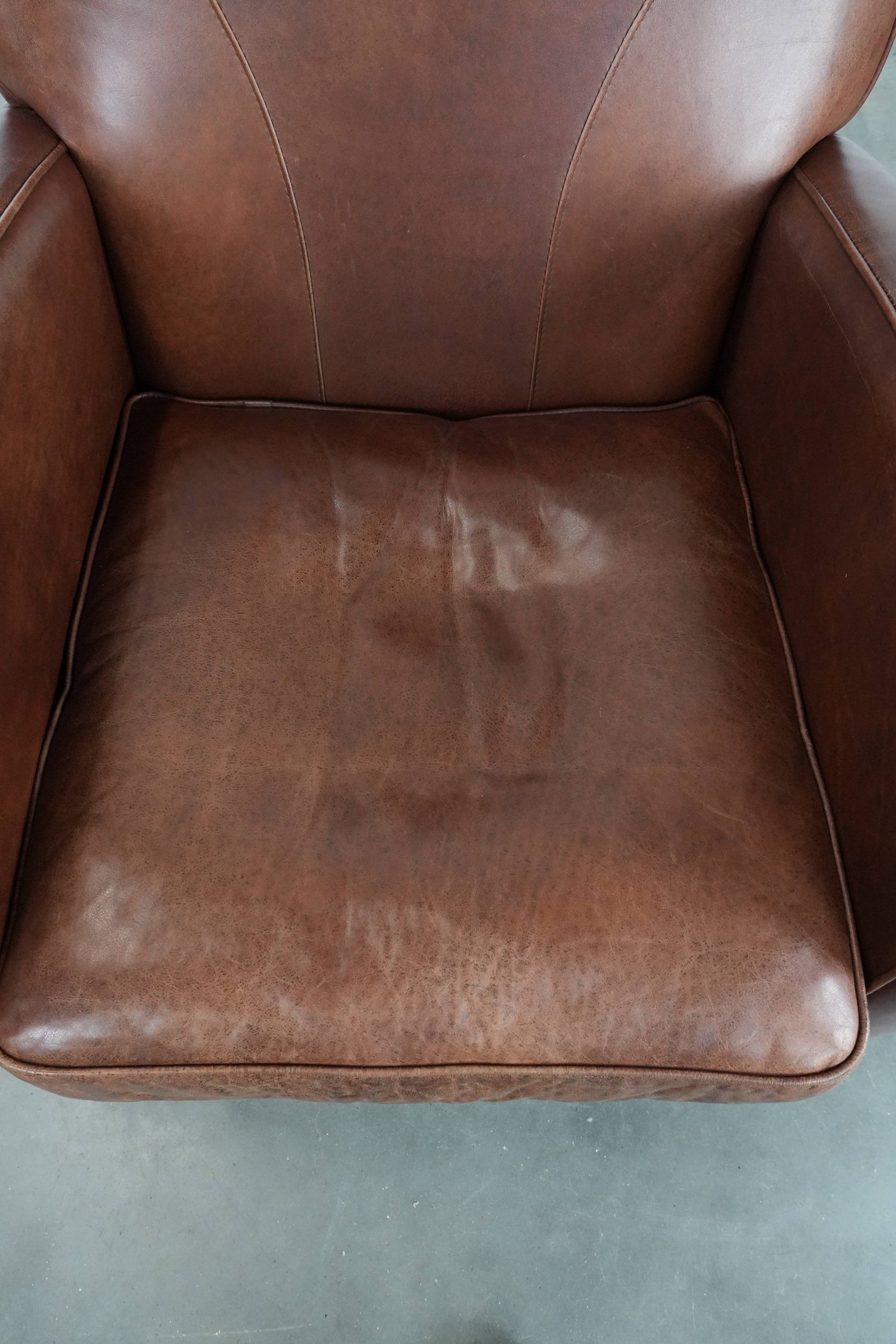 Beautiful art deco design armchair made of cowhide leather in English style