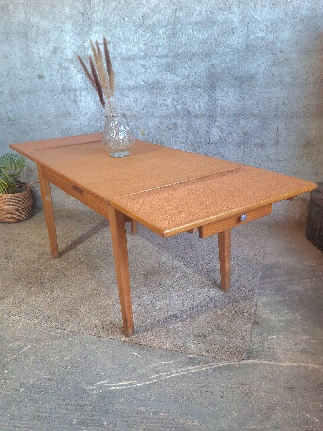 1950s dining table with sliding extensions
