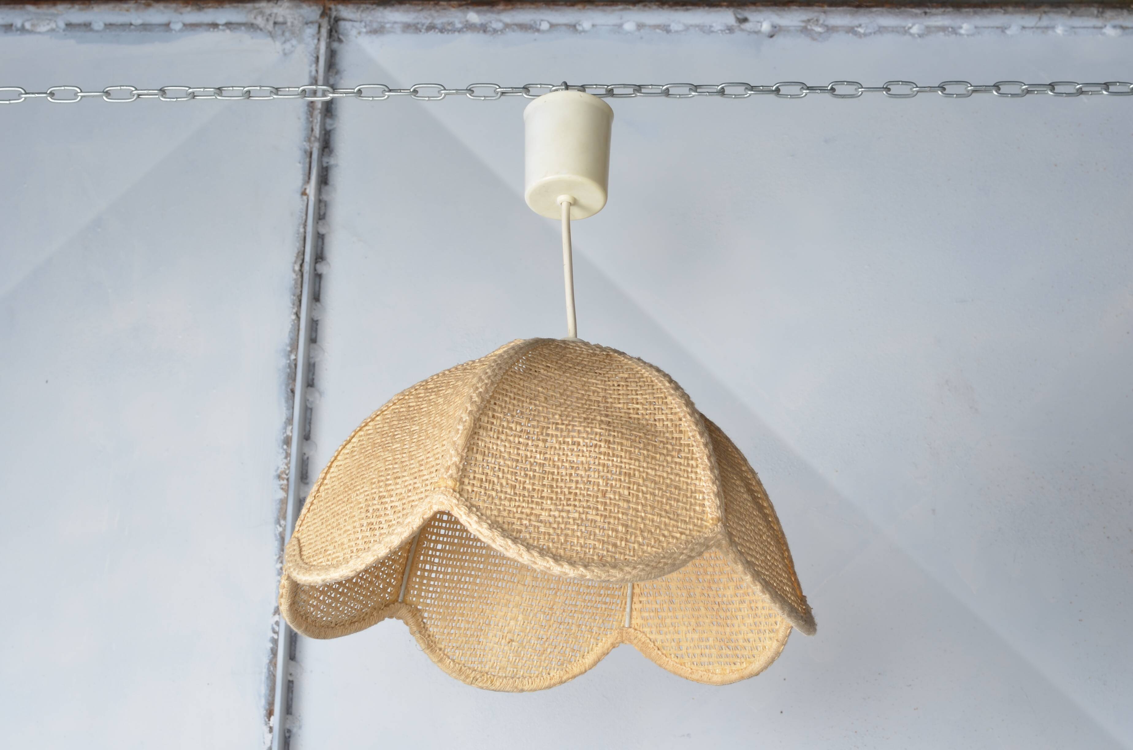 Braided flower pendant