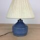 Blue ceramic lamp foot and white wool lampshade