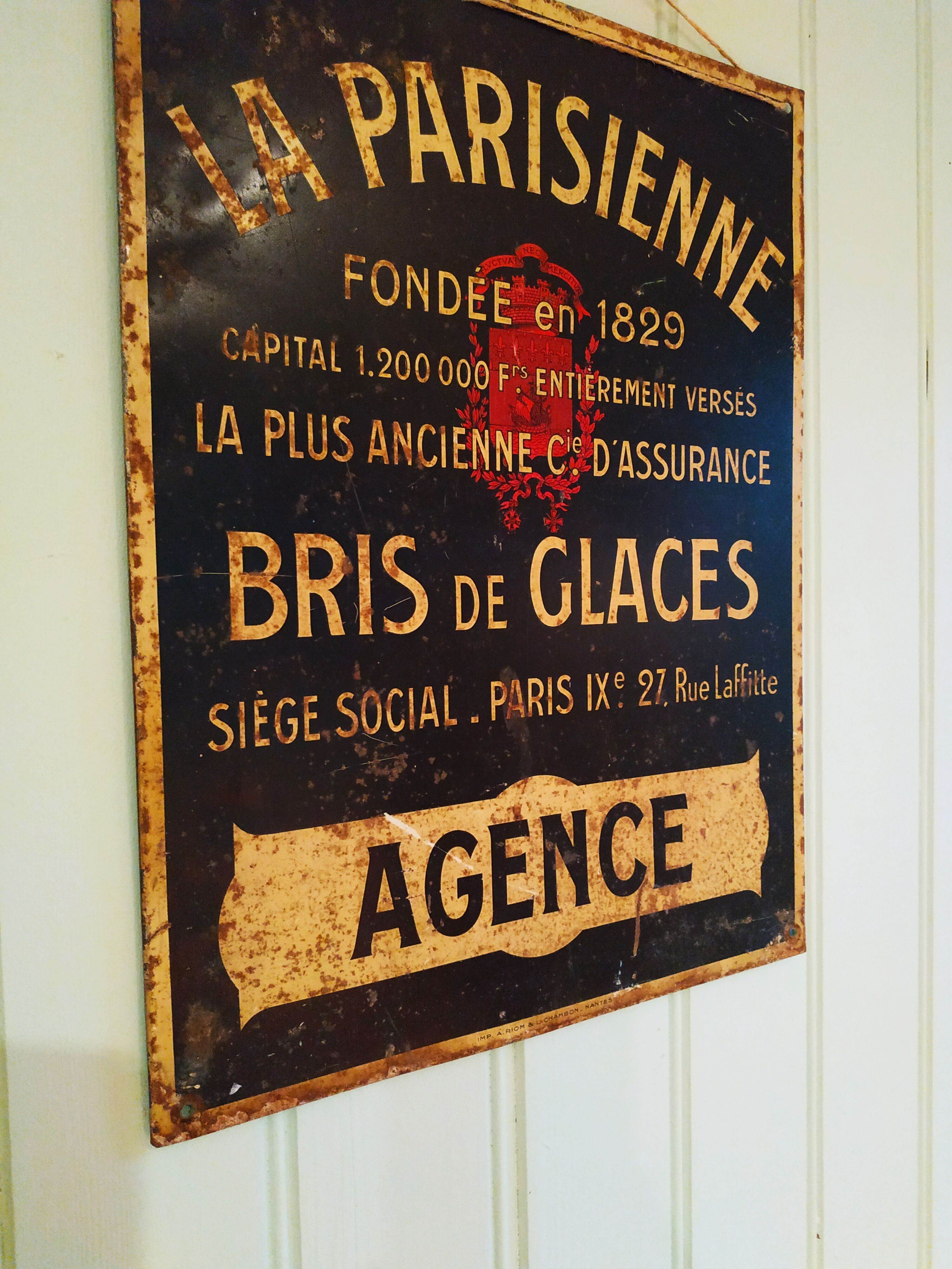 Plaque émaillée de la compagnie d'assurance "La Parisienne"
