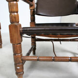 Pairs of vintage Safari style armchairs in wood and leather