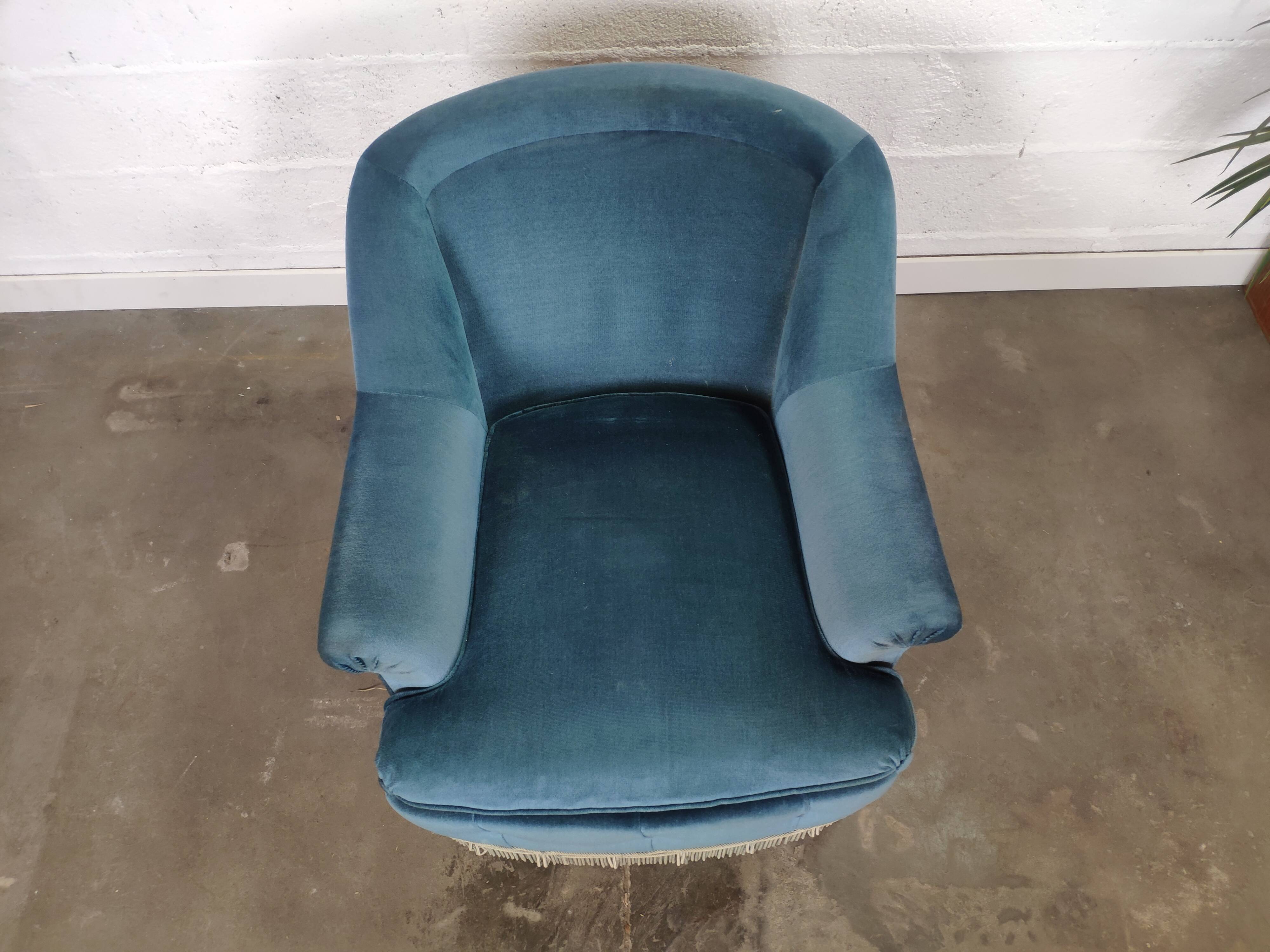 Pair of blue velvet armchairs with fringes