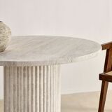 Omega circular dining table in natural travertine