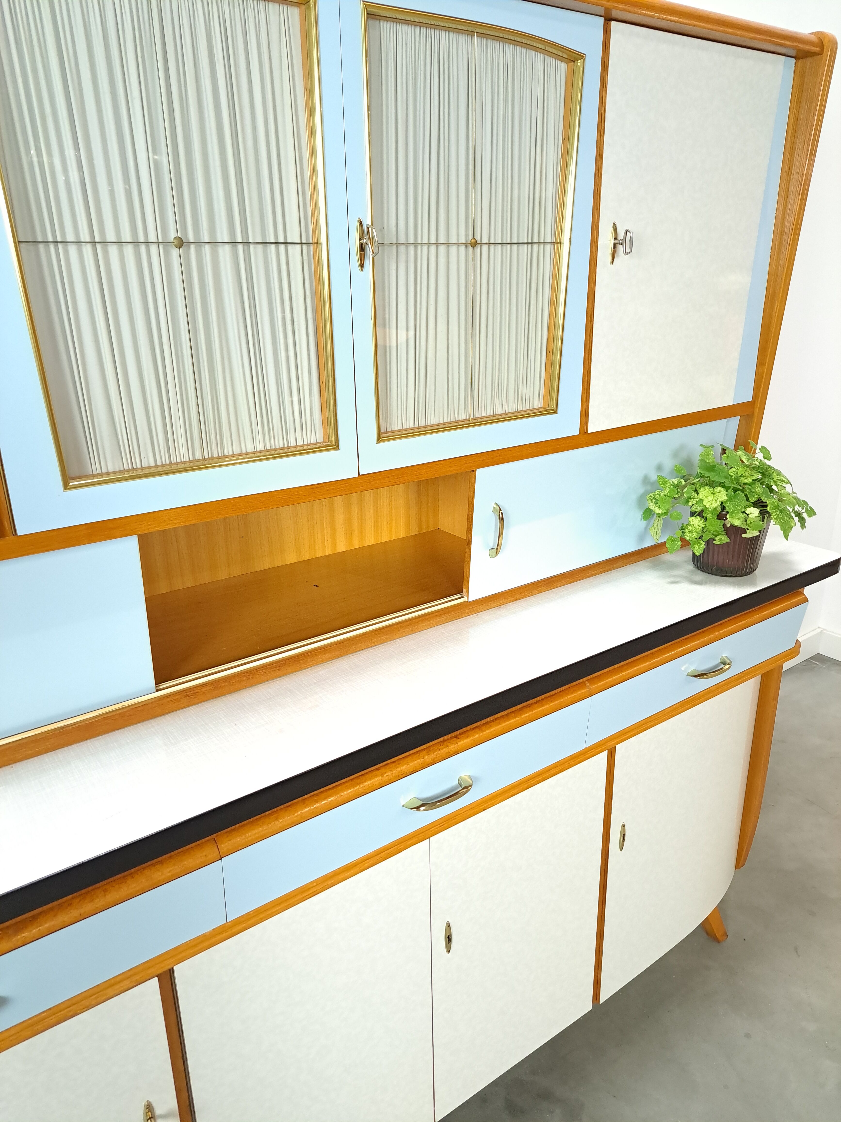 50s vintage kitchen cabinet with brass and formica