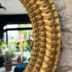 Pair of antique oval mirrors gilded with gold leaf and mercury.