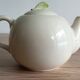 Slush teapot with embossed fruit decoration