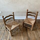 Suite of two low chairs in wood and straw 1960